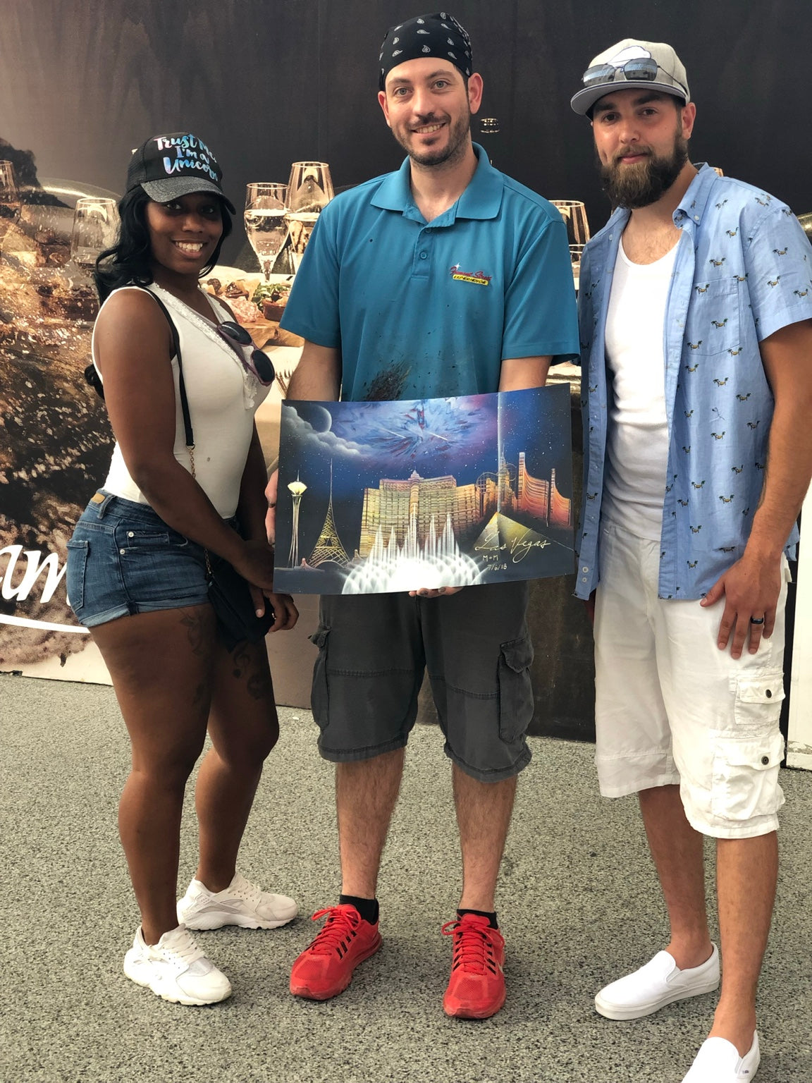 Happy collectors with a Matthew Mandala Las Vegas original